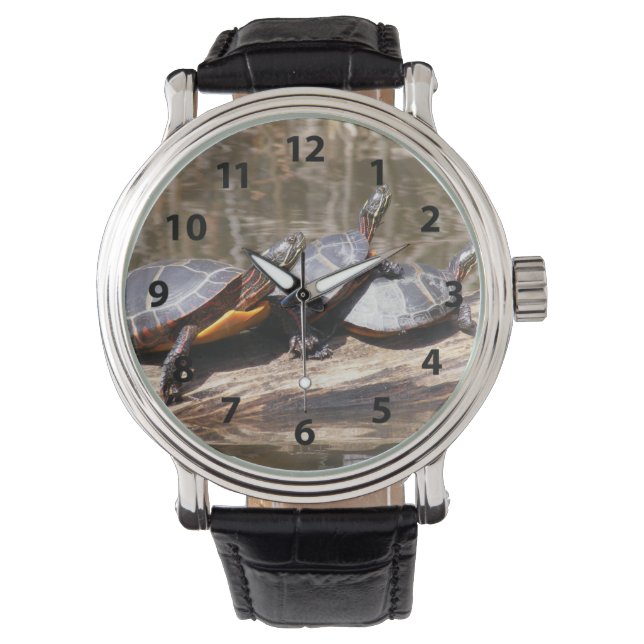 Tre sköldpaddor på en logg armbandsur (Framsida)