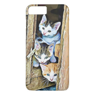 Tre små kattungar tittar ut telefonfodral