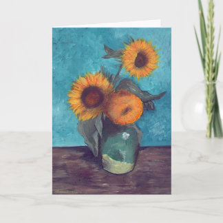 Tre solblommor i vas kort