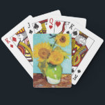 Tre solblommor | Vincent van Gogh Casinokort<br><div class="desc">Tre solrosor (1888) av Vincent van Gogh är ett levande liv som visar konstnärens namnteckning tjocka brushstrokes och djärva använda av färg. Målningen har tre solblommor i ett enkelt vas, deras gyllene petaler som kontrasterar mot akvafblått. Van Goghs livliga palett för gult och liv till scenen och fångade blommornas flyktighet....</div>