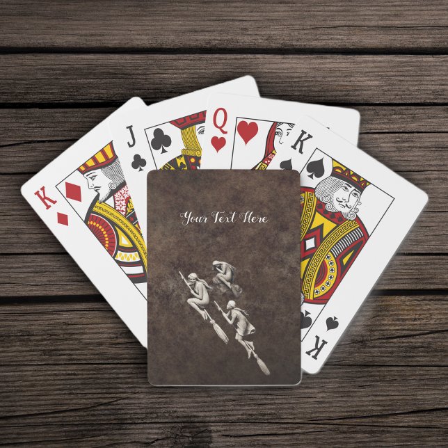 Tre Söt Vita ljusvittnen som flyger på rum Casinokort (Three pretty white witches flying on brooms on mottled brown deck of playing cards.)