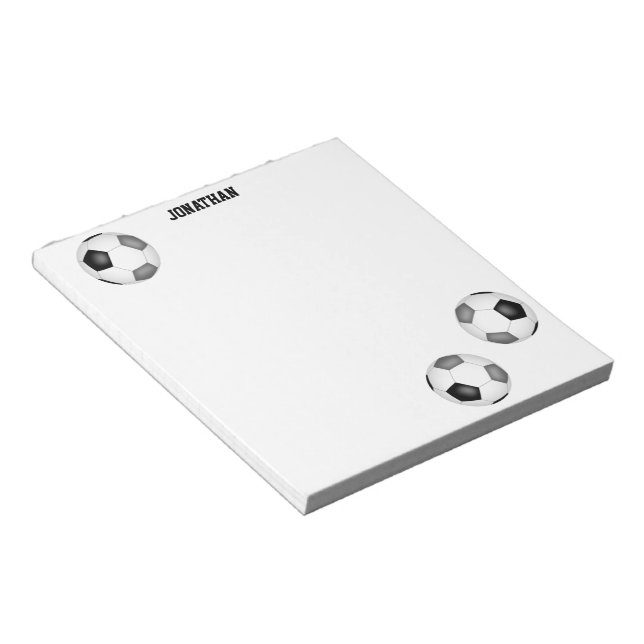 tre svarta grått-fotbollar personlig anteckningsblock (Vinklad)