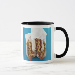 Tre varmkorvar i bullar mugg