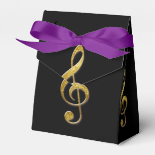 Treble clef-ruta för "guld" presentaskar