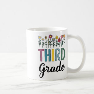 Tredje klass lärare vildblomma tillbaka till skola kaffemugg