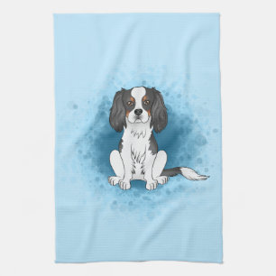 Trefärgad Cavalier King Charles Spaniel Hund På Bl Kökshandduk