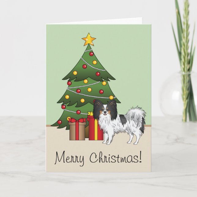 Trefärgad fjärilshund Glad hund vid en julgran Kort (Framsida)