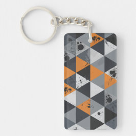Trekantig design i orange, svart och grått