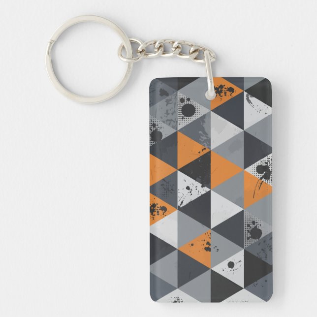 Trekantig design i orange, svart och grått (Framsidan)