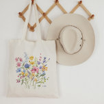 Trendig Colorful Wildblommor med Monogram Tygkasse<br><div class="desc">Den här snyggten har en bukett med söt boho-blommor,  i nyanser av blått,  lila,  rosa och gult med vackra löv av grönt. Lägg till ditt monogram eller initialer vid grund. Perfektens bröllopsfest- eller keepsaké,  särskilt för din maid of honor- eller blomflicka.</div>