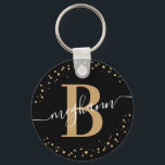 Trendig Girly Black Guld Namn-skript, monogrammat Nyckelring<br><div class="desc">Girly, elegant, trendig, modern, svart och guld, den första namn-skriptkedjan för anpassningsbar med monogrammerade nyckelkanaler i personlig. Med ett inledande mongram och ett giftigt namn-skript i ett handskrivet calligraphy-tecken byts svan-typsnitt ut och den prickade cirkeln ram runt ditt monogram. Perfekt feminin gåva till syster, mor, flickvän, födelsedag, bröllop, möhippa, söt...</div>
