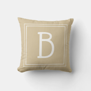Trendig monogram neutral ljusbrun och vit kudde