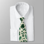 Trendiget Tropiskt Foliage Grönt Löv Mönster Slips<br><div class="desc">Det tropiska Trendiget Foliage Greenery och Guld Patterned Slipsar - med tropiska löv och en färg-redigerbar bakgrund. För Groom och Groomsman, i en fet färg-palett med rik gröntar, emerald och guld. Den här designen är perfekt för en strand, destination eller sommartid i bröllop. Med känslan av ett tropiskt paradis kommer...</div>