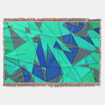 triangulära urklipp i grönt på blå bakgrund, grova