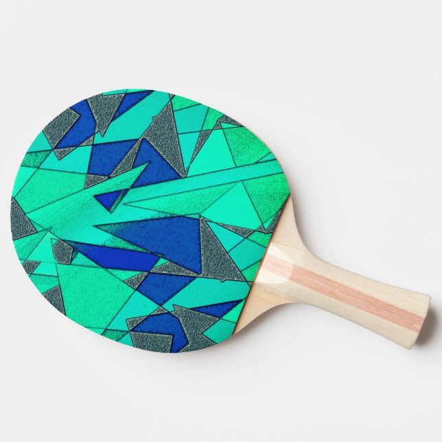 triangulära urklipp i grönt på blå bakgrund, grova pingisracket (Sidan)