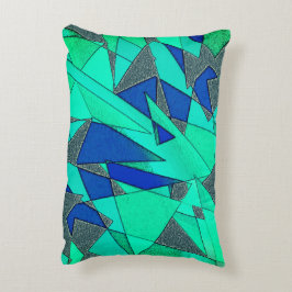 triangulära urklipp i grönt på blå bakgrund, grova prydnadskudde