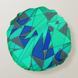 triangulära urklipp i grönt på blå bakgrund, grova rund kudde