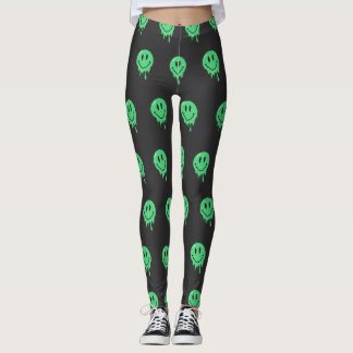 Trippig droppande grön smältande leende ansikte es leggings