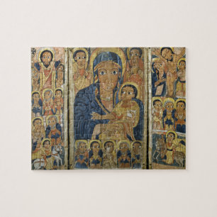 Triptychen centrerar panelen med Mary och henne Pussel