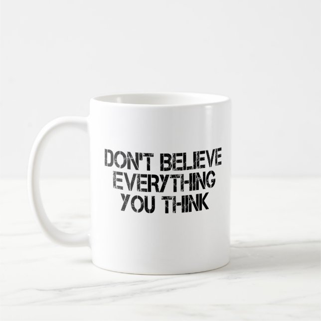 Tro inte på allt du tror kaffemugg (Vänster)