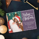 Tro på julmagi 2-familjens foton violett julkort<br><div class="desc">Modern Julhälsningar kort med en av din favoritjulfamilj porträtt på den lämnat,  kompletterad med ord "Tro på julens magi" på högerna över en modern violett bakgrund,  anpassade med ditt eget hälsning-budskap. Du kan ladda upp ytterligare en bild på baksidan av kortet.</div>