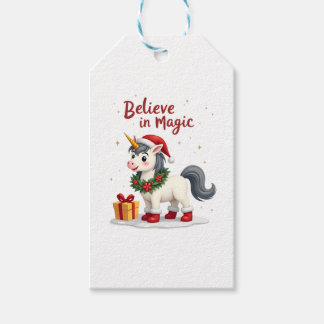 Tro på magisk firande enhörning som bär jul presentetikett