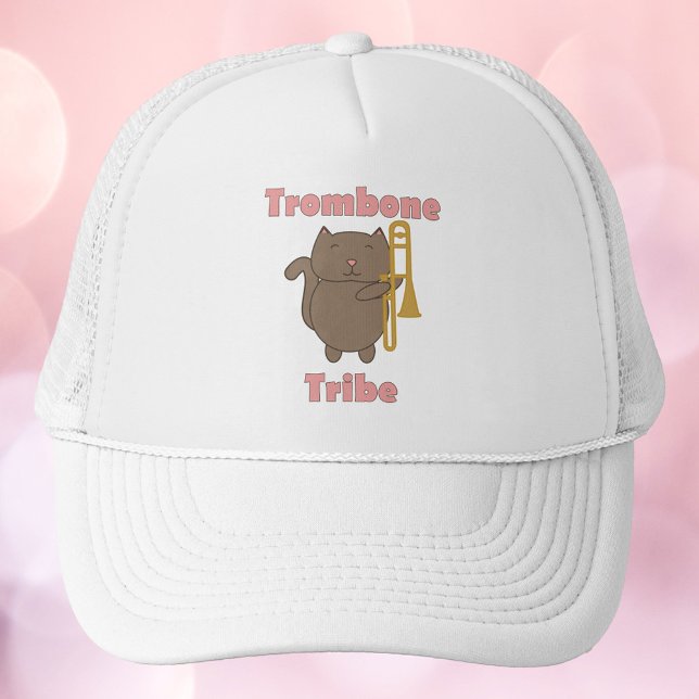 Trombone Tribe Kawaii Katt Rosa Bokstäver Keps (A hat with a brown cat holding a trombone and the words trombone tribe in pink.)