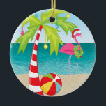 Tropical Beach Flamingo Handflatan jul Ornament<br><div class="desc">Tropical Beach Flamingo Handflatan Träd, julprydnad. Ta med en liten bit tropiskt paradis till Julgran med denna vismliga prydnad! En lekfull flamingo, sport en julhatt, vader i kristallklart havsområde vatten, medan ett närliggande handflatan träd glider försiktigt i bron. Den här charmerande dekorationen fångar kärnan av en solig julflykt och kommer...</div>