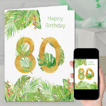 Tropical Foliage Grönt och Guld Big 80 Birthday Kort<br><div class="desc">Stora 80-årsjubileum. Konstruktionen har ett stort nummer 80 i texturerat guld, som är insnärjt med tropiska löv. På utsidan finns det också en gräns av handflatan löv, löv av bananer, monstera löv och färgstarka tropiska blommor med texten "grattis på födelsedagen". Insidan av kortet är också dekorerad med nummer 80 och...</div>