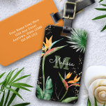 Tropical Island Blommigt Monogram Script Guld Blac Bagagebricka<br><div class="desc">Ta med dig lite elegant tropisk gästfrihet var du än reser, när du användor den här chicen, modernt bagagemärke. Förbluffande, sofistikerade, färgstarka, tropiska vattenfärgsfåglar av paradisblommor, faux guld glitter och kalligrafi av personlig med ett fet monogram initialt, täcker över en dramatisk svart bakgrund. Anpassa med ditt namn och monogram. Gör...</div>