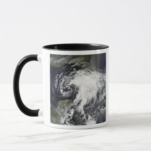 Tropical Storm Alberto Mugg (Vänster)
