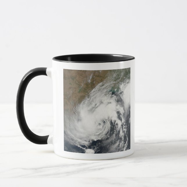 Tropical Storm Bijli Mugg (Vänster)