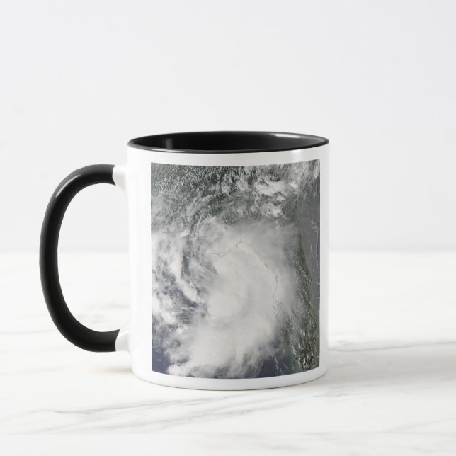 Tropical Storm Claudette Mugg (Vänster)