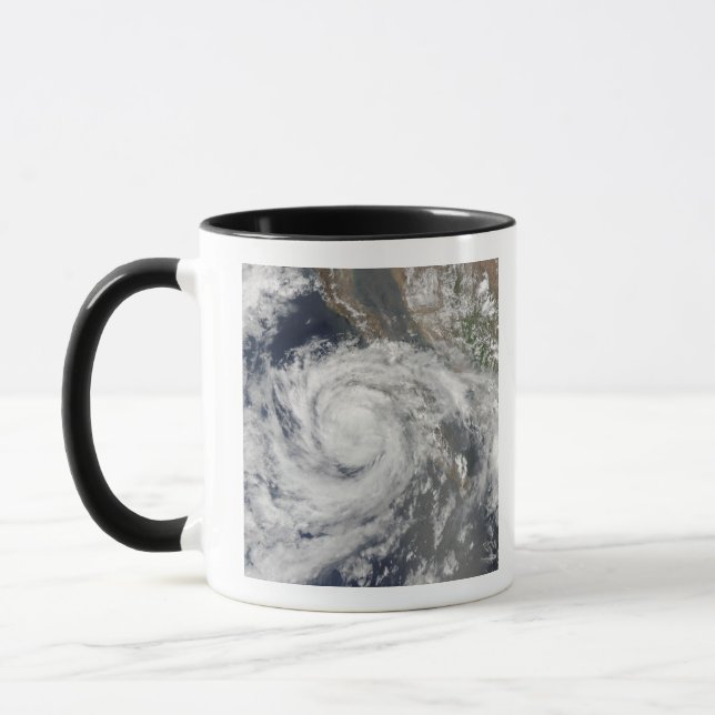 Tropical Storm Emilia Mugg (Vänster)