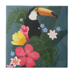 Tropical Toucan i Wilderness Kakelplatta<br><div class="desc">Tropical Wilderness I av Grace Popp. En Toucan sitter vid en samling vackra tropiska löv och blommor. | 164259Z</div>