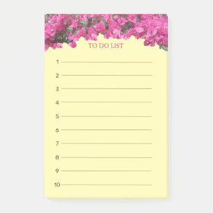 Tropisk blomsterlista på gul bakgrund post-it block