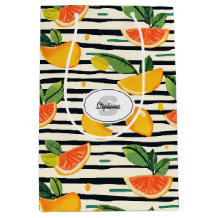 Tropisk frukt randig gul orange rosa och grön