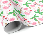 Tropisk persikojul Flamingos Fåglar Presentpapper<br><div class="desc">Beach tema julklapp med flamingor med julhattar. Ornament och helgdag ljus dekorerar träd i handflatan. Lägg dina gåvor i varm vintern. Du kan göra mönster större eller mindre. Klicka på Anpassa och justera storleka genom att använda plus-/minusknapparna. Copyright Bendel Kreativ Design LLC Alla reserverade Höger.</div>