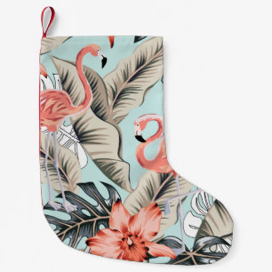 Tropisk rosa flamingo med orkidblommor och lea liten julstrumpa