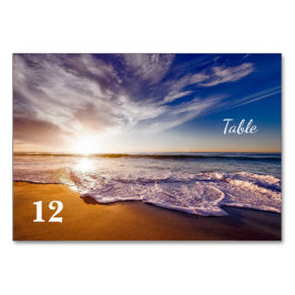 Tropisk solnedgångstrand som gifta sig bordsnumret bordsnummer