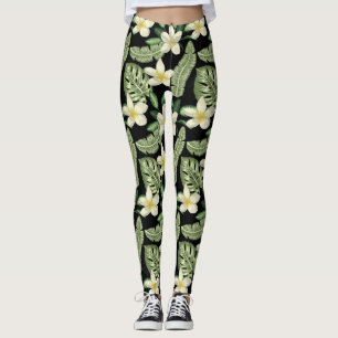 Tropiska blommor och löv i blommigt mönster leggings
