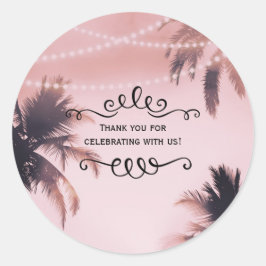 Tropiska palmer och rosa strandljus runt klistermärke