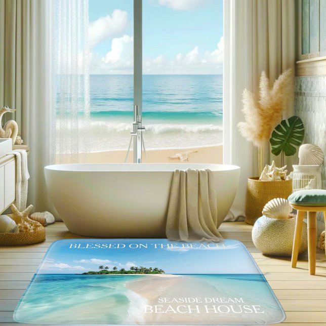 Tropiskt biskopsblock av turkos-blått badrumsmatta (Bath mat featuring a tropical paradise island in a turquoise blue ocean with a sandy beach)