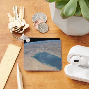 Tropiskt blå Vatten av det persiska Bukt. Nyckelring