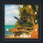 Tropiskt Dreamy-block Fyrkantig Klocka<br><div class="desc">En drömmande magisk bild. En ljus och solig tropisk strand med kloka vita moln ovanför, på en utdragen plats, omgiven av stora handflatan-träd. En gammal halmstrumma sitter på stranden tittar bruten och härjad av tid. lugnen lugnande vatten är en coola blå och turkosa grönt. Bild användor HDR-fotografi för att skapa...</div>