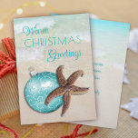 Tropiskt julklapp av stjärnfisk Ornament Beach Helgkort<br><div class="desc">Tropiska julhälsningskort. Varma semesterhälsningar,  anpassningsbar i blått på framsidan och insidan. En stor brunstjärt och tealblått träd-ornament på framsidan. Crystal clear Sea vatten är bakgrundsbilden för lodräts framsida och insida,  vikta kort.</div>