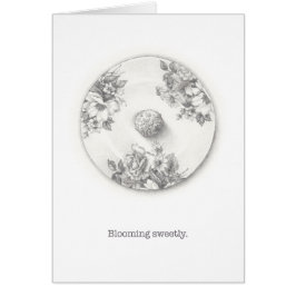 Truffle på en illustration av platta pennor hälsningskort