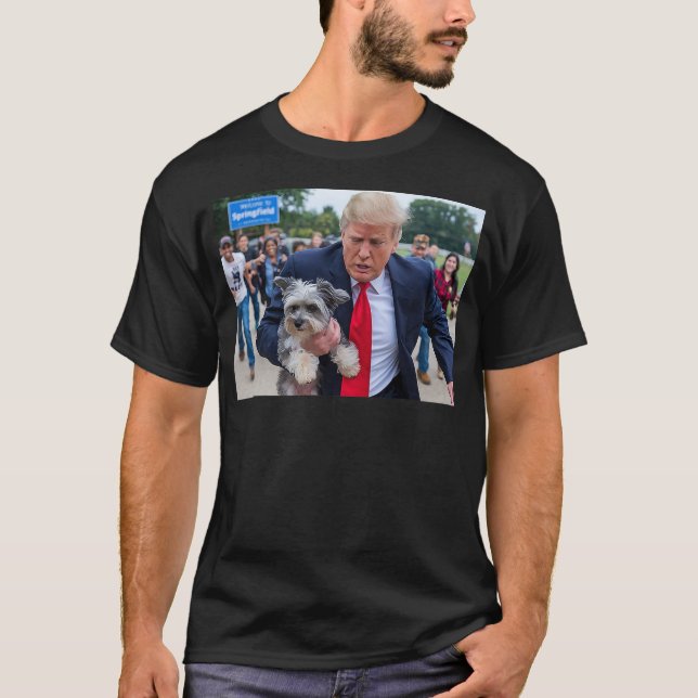 Trump Saving A Dog Funny Eating Dogs Political Hum T Shirt (Framsida)