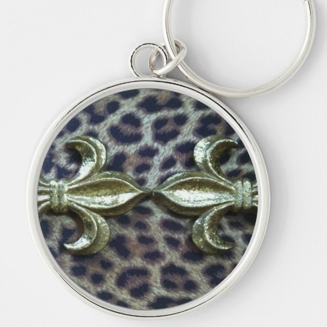 TRYCK FÖR VILDSAK FLEUR DE LIS PÅ LEOPARD RUND SILVERFÄRGAD NYCKELRING (Framsidan)