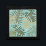 Tryckfärgad Löv Minnesask<br><div class="desc">"Faded Tropical Löv I" av Jade Reynolds. Innehåller en samling tropiska löv i ett fäst mönster.</div>